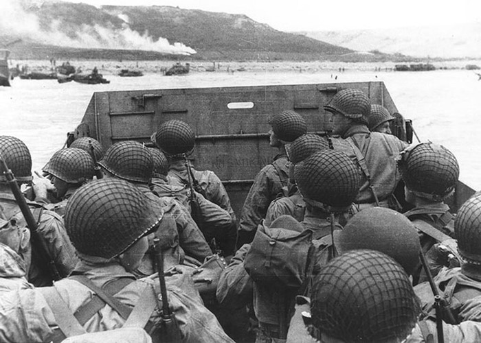 Troops in an LCVP landing craft approach Omaha Beach on D-Day, June 6, 1944.